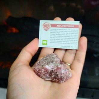 Raw Red Aventurine crystal with a description 
