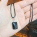 Faceted Black Agate rectangular shape stainless steel Zirconia clasp pendant with a black cord