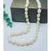 Freshwater Pearl oval necklace with flower clasp