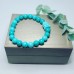 Turquoise beaded Buddha charm bracelet 8 mm