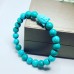Turquoise beaded Buddha charm bracelet 8 mm