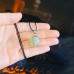 Faceted Prehnite Crystal Pendant with a black cord