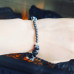 Snowflake Obsidian, Matte Hematite Lotus charm bracelet