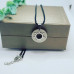 Sun Stainless steel silver and gold tone black cord Amulet