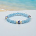 Heaven’s Flow Bracelet - 6 mm Aquamarine with Porcelain beads Heaven’s Flow Bracelet - 6 mm Aquamarine with Porcelain beads