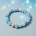Heaven’s Light Bracelet - 8 mm Aquamarine with Murano-style bead Heaven’s Light Bracelet - 8 mm Aquamarine with Murano-style bead