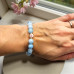 Heaven’s Light Bracelet - 8 mm Aquamarine with Murano-style bead Heaven’s Light Bracelet - 8 mm Aquamarine with Murano-style bead