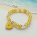 Sweet Grace Bracelet - 6 mm Citrine with a heart candy charm Sweet Grace Bracelet - 6 mm Citrine with a heart candy charm
