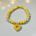 Sweet Grace Bracelet - 6 mm Citrine with a heart candy charm Sweet Grace Bracelet - 6 mm Citrine with a heart candy charm
