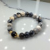 Faith in Contrast Bracelet - 10 mm Black and White Spotted Agate Faith in Contrast Bracelet - 10 mm Black and White Spotted Agate