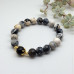 Faith in Contrast Bracelet - 10 mm Black and White Spotted Agate Faith in Contrast Bracelet - 10 mm Black and White Spotted Agate