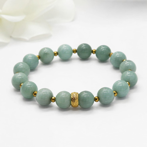 Jade Bracelet with Gold Stainless Steel Spacer Jade Bracelet with Gold Stainless Steel Spacer