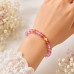 8 mm Pink Tourmaline Bracelet with Gold Accents