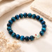 Blue Tiger's Eye Bracelet with Enamel Accent Bead Blue Tiger's Eye Bracelet with Enamel Accent Bead