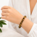 8 mm Tiger's Eye Bracelet with Gold Stainless Steel Spacer 8 mm Tiger's Eye Bracelet with Gold Stainless Steel Spacer