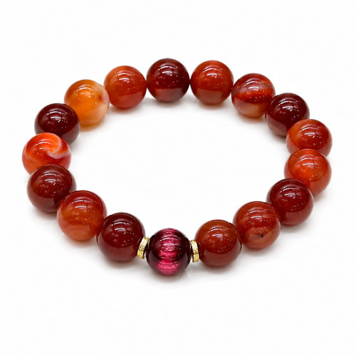 12 mm Carnelian Bracelet with Pink Cat Eye Accent Bead 12 mm Carnelian Bracelet with Pink Cat Eye Accent Bead