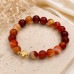 10 mm Carnelian Bracelet with Gold Stainless Steel Cross Charm