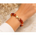 10 mm Carnelian Bracelet with Gold Stainless Steel Cross Charm