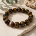 12 mm Tiger's Eye Bracelet with Cat Eye Accent Bead 12 mm Tiger's Eye Bracelet with Cat Eye Accent Bead