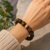 12 mm Tiger's Eye Bracelet with Cat Eye Accent Bead 12 mm Tiger's Eye Bracelet with Cat Eye Accent Bead