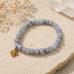 8 mm Jade Bracelet with Czech Crystals & Gold Stainless Steel Flower Charm 8 mm Jade Bracelet with Czech Crystals & Gold Stainless Steel Flower Charm