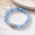 10 mm Faceted Aquamarine Bracelet with Gold Stainless Steel Moon Bead Charm