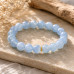 10 mm Faceted Aquamarine Bracelet with Gold Stainless Steel Spacer 10 mm Faceted Aquamarine Bracelet with Gold Stainless Steel Spacer