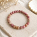 8 mm Matte Rhodonite Bracelet with Gold Stainless Steel Spacer 8 mm Matte Rhodonite Bracelet with Gold Stainless Steel Spacer