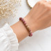 8 mm Matte Rhodonite Bracelet with Gold Stainless Steel Spacer 8 mm Matte Rhodonite Bracelet with Gold Stainless Steel Spacer