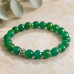 8 mm Faceted Green Agate Bracelet with Silver-Tone Spacer & Green Zirconia Charm 8 mm Faceted Green Agate Bracelet with Silver-Tone Spacer & Green Zirconia Charm