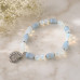 8 mm Opalite and Aquamarine Bracelet with Stainless Steel Shell Charm 8 mm Opalite and Aquamarine Bracelet with Stainless Steel Shell Charm