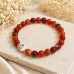 8 mm Carnelian Bracelet with Hand-Painted Porcelain Bead 8 mm Carnelian Bracelet with Hand-Painted Porcelain Bead