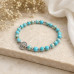 6 mm Turquoise Bracelet with Silver-Tone Accents and Stainless Steel Tree of Life Charm
