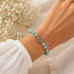 6 mm Turquoise Bracelet with Silver-Tone Accents and Stainless Steel Tree of Life Charm