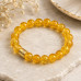 10 mm Citrine Bracelet with Gold Stainless Steel Engraved Moon Charm 10 mm Citrine Bracelet with Gold Stainless Steel Engraved Moon Charm