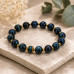 10 mm Blue Tiger's Eye Bracelet with Gold-Tone Accents 10 mm Blue Tiger's Eye Bracelet with Gold-Tone Accents
