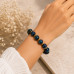 10 mm Blue Tiger's Eye Bracelet with Gold-Tone Accents 10 mm Blue Tiger's Eye Bracelet with Gold-Tone Accents
