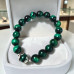 10 mm Green Tiger’s Eye Bracelet with Stainless Steel Petal Spacers 10 mm Green Tiger’s Eye Bracelet with Stainless Steel Petal Spacers