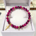 6 mm Pink Tiger's Eye Bracelet with Gold Stainless Steel Cross 6 mm Pink Tiger's Eye Bracelet with Gold Stainless Steel Cross