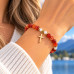 6 mm Carnelian Bracelet with Czech Crystals and Gold Stainless Steel Cross 6 mm Carnelian Bracelet with Czech Crystals and Gold Stainless Steel Cross