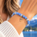 8 mm Aquamarine Bracelet with Czech Crystals and Gold Stainless Steel Cross 8 mm Aquamarine Bracelet with Czech Crystals and Gold Stainless Steel Cross