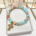 8 mm Amazonite Bracelet with Zirconia Gold-Tone Stainless Steel Cross Charm 8 mm Amazonite Bracelet with Zirconia Gold-Tone Stainless Steel Cross Charm