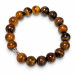 10 mm Tiger's Eye Bracelet with Stainless Steel Spacer Charm 10 mm Tiger's Eye Bracelet with Stainless Steel Spacer Charm