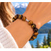 10 mm Tiger's Eye Bracelet with Stainless Steel Spacer Charm 10 mm Tiger's Eye Bracelet with Stainless Steel Spacer Charm