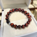 10 mm Red Tiger’s Eye Bracelet with Stainless Steel Charm 10 mm Red Tiger’s Eye Bracelet with Stainless Steel Charm
