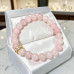 8 mm Rose Quartz Bracelet with Gold-Tone Zirconia Charm 8 mm Rose Quartz Bracelet with Gold-Tone Zirconia Charm