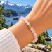 6 mm Rose Quartz Bracelet with Gold-Tone Stainless Steel Charm 6 mm Rose Quartz Bracelet with Gold-Tone Stainless Steel Charm