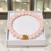 6 mm Rose Quartz Bracelet with Gold-Tone Stainless Steel Charm 6 mm Rose Quartz Bracelet with Gold-Tone Stainless Steel Charm