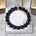 10 mm Faceted Blue Goldstone Bracelet with Silver-Tone Stainless Steel Spacer