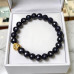 8 mm Faceted Blue Goldstone Bracelet with Gold Stainless Steel Charm